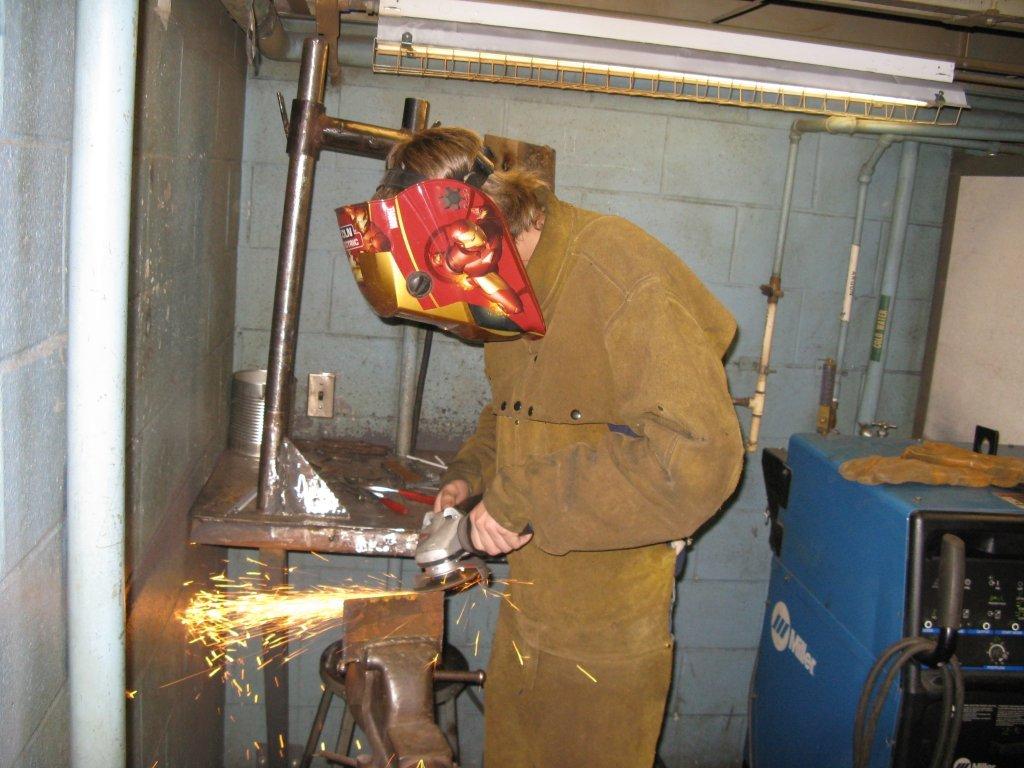 Andrew Martin prepping metal to weld