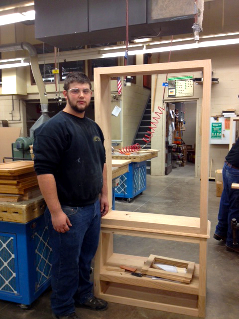 Steve France with his partially completed oak gun cabinet.
